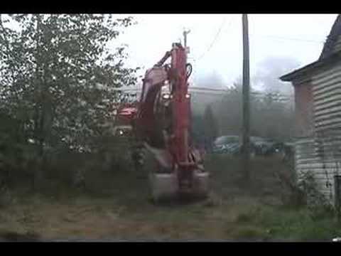 Offloading a Hitachi EX 200 Excavator