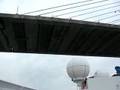 Carnival Celebration passes under bridge