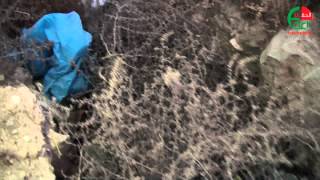 انتهاك صارخ لحرمة الموتى في حي العراتفه بالرصيفة ... تقرير تلفزيوني