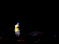 Travis from Gym Class Heroes talking at a concert in Miami