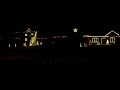 Light Show..Feliz Navidad..2 houses combined effort!