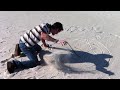 Trying to fix a stick he found on the beach. It didn't work out too well, maybe he ought to try Alkahestry...
