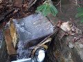 A visit to a fellow prepper's place reveals an awesome hydro electric setup off of a small stream.