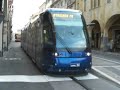 *** English text below ***Il tram Translohr patavino in arrivo alla fermata Cavallotti, dove il pantografo viene abbassato per affontare, con alimentazione a batterie, il tratto Cavallotti-Santo privo di linea aerea.Il video dura meno del voluto, e termina bruscamente a causa di un autista d'autobus poco professionale che taglia la curva salendo sulla ciclabile e tentando invano di porre fine all'esistenza della mia bicicletta, parcheggiata a filo muro.Forse un aggiornamento sulle tecniche di guida in curva non sarebbe malvagio; e anche un pelo di rispetto per le piste ciclabili, magari...W i mezzi a via guidata. Possibilmente con rotaie vere e ruote d'acciaio!~~~ For English readers ~~~Padua TransLohr tram arriving at Cavallotti stop, where pantograph is lowered to run in the Cavallotti-Santo stretch, where the vehicle is feeded by batteries since there are no over head wires.This video ends too early, due to an improper bus driver who jumps on the bycicle lane, trying to kill my poor bike.Maybe a little upgrade of driving skills is needed, and also a little of respect for bike lanes...Let's hope in fixed guide vehicles, better with iron wheels, not dumb tires!(04/04/2007 - Casio Exilim EX-Z1050)