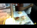 Burger Ramly (pron. BER-GERR RAHM-LEE) is a type of street cuisine found in Malaysia. It is an asian styled burger prepared with a Ramly brand patty (chicken, beef, deer, rabbit), cheese, egg, cucumber, lettuce, cabbage, mayo, sweet chili sauce, and Ajinamoto brand white pepper flavoring. It can be considered to be a Malaysian equivalent to a New York hotdog, or an Aussie pie.