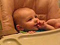 Isaac on the big boy's chair
