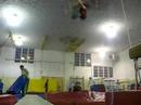 Triple backfilip on trampoline