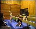 seven year old trainin on beam in gym