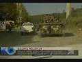 Russian tanks drive through Georgian police barricade
