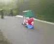 tom wid bin over his head