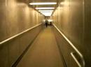 Walking down the jetway and onto the airplane at Denver International Airport