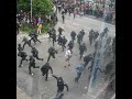 G8 protest riots - throwing stones