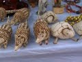 Moving carved wooden animal souvenirs in Parintins, Brazil