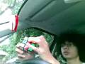 videos de Daredevil solving rubiks cube while driving and singing