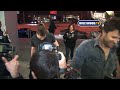 sam worthington becomes a paparazzo at trousdale in west hollywood, california. usa