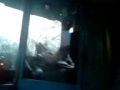 Travel West Midlands bus driver reads book whilst driving on dual carriageway