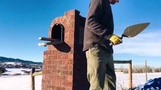timelapse of brick mail box being built