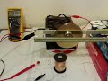 with two coils you can use the back emf as ac voltage. i think 4 coils at 45 degrees then every 90 degrees will give the most ac voltage back. hope i am right!!