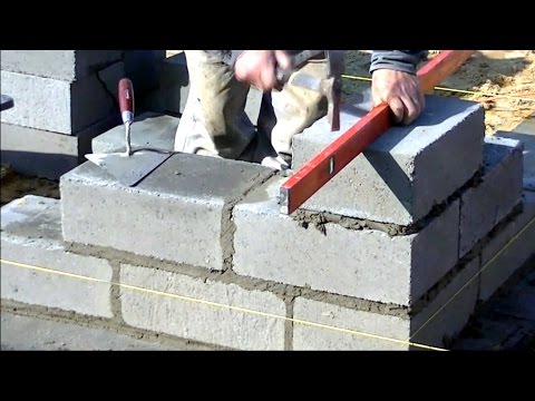 Budowa domu krok po kroku. dzień 6-11 Murowanie ściany fundamentowej. www.durski-domy.pl