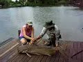 Lady landing a huge Giant Mekong Catfish! Lady landing a huge Giant Mekong Catfish!