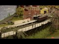 This is an update for the 2008 film about our model of Thurston station as it would have been in the 1950's. This film focusses on some of the excellent OO rolling stock (scratch built, kit built or weathered/modified RTR) by various Ely & District Model Railway Club Members for this 20ft x 10ft exhibition layout. Shot at the 20011 Model Rail Scotland Exhibition in Glasgow, the film shows some of the typical trains that would have run on this stretch of line. The first minute is just shots getting the team and the layout to Scotland, then different categories of trains are shown and at the end it's some coming home shots and a few out-takes - derailments of course! Maybe in 2012 we hope to produce a much more involved film (or films) with a narrative explaining some of the details about the prototypical stock being shown, hopefully with a few supplementary close-up photographs etc. In the meantime this film has been cut to a royalty free/copyright free music backing track. You can find out a lot more about this model and its prototype, located 4.5 miles east of Bury St. Edmunds in Suffolk, by watching the 2008 Thurston OO film, split into two 10 minute sections on the two links below: Thurston OO Part 1: www.youtube.com Thurston OO Part 2: www.youtube.com You can also find out more about Ely & District Model Railway Club by looking at our website: www.elymrc.org.uk Enjoy! And if you live in the Ely or surrounding area why not come and find out what we do? More details <b>...</b>