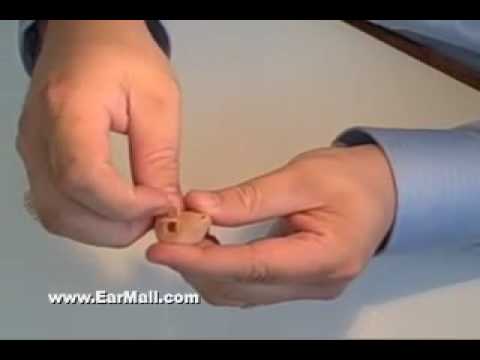 how to adjust oticon hearing aids