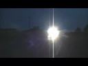 Finnish fast-running freght train passing level crossing
