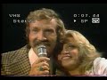 MARTY ROBBINS AND AN UNIDENTIFIED WOMAN SINGING