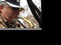 russian saxophone player in central park.
new york city.
december 2007
