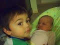 Tommy kisses little sis, Emma