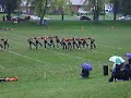 us pommers performin at halftime! yup it was raining..kinda sucked but hey i think i turned out okay!