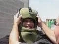 Raw: reporter tries on bomb suit