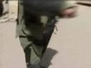Raw: reporter tries on bomb suit
