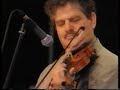 Andy Stein (violin)Michaele Ariodante (guitar)Ascona (Switzerland), July 2002http://www.andysteinmusic.comhttp://www.linopatruno.ithttp://www.michaelsupnick.comEddie Lang (October 25, 1902 -- March 26, 1933) was an American jazz guitarist, considered by many[citation needed] to be the finest of his era, and to be the greatest rhythm player of all time, providing great influence for many guitarists, including Django Reinhardt.Lang was born Salvatore Massaro, the son of an Italian-American[1] instrument maker in Philadelphia, Pennsylvania. At first, he took violin lessons for 11 years. In school he became friends with Joe Venuti, with whom he would work for much of his career. He was playing professionally by about 1918, playing violin, banjo, and guitar. He worked with various bands in the USA's north-east, worked in London (late 1924 to early 1925), then settled in New York City.He played with the bands of Venuti, Adrian Rollini, Roger Wolfe Kahn and Jean Goldkette in addition to doing a large amount of freelance radio and recording work.In 1929 he joined Paul Whiteman's Orchestra, and can be seen and heard in the movie The King of Jazz.When Bing Crosby left Whiteman, Lang went with Bing as his accompanist and can be seen with him in the 1932 movie Big Broadcast. Lang also played under the pseudonym Blind Willie Dunn on a number of blues records with Lonnie Johnson.Eddie Lang died from a sudden hemorrhage following a tonsillectomy in New York City.http://en.wikipedia.org/wiki/Eddie_Lang