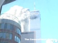 Shot from right below North Tower, North tower burning,...