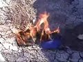 Burning Yankee and Mets hat Burning Yankee and Mets hat