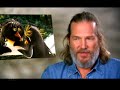 jeff bridges voices a surfing dude with musical talents in animated film surf's up.