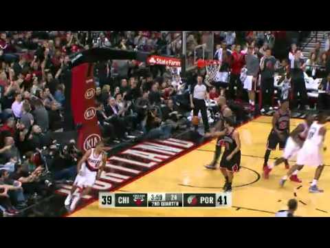 Nicolas Batum bullies on the Bulls with a dunk