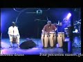From the Dual CD/DVD disc available at www.voiceprint.co.ukWorld Drummers EnsembleA Coat of Many ColoursDisc 1 Audio CD1. Conundrum 2. Majorette 3. Prism 4. Baye Kene N'Diaye5. Ritm Kompozisyon6. A Coat Of Many Colours7. Self Portrait8. Sa N'Diaye9. B'Boom 10. Encuentro (Encounter)Disc 21. Reverse of Disc - DVD Side In Concert Footage2. Track Select3. Additional InfoDoudou N'Diaye Rose---Sabar and Gorom BabassChad Wackerman-- Acoustic drums, Pitched drums and Pitched cymbals.Luis Conte --  Conga Drums, Timbales, Cajon, PercussionBill Bruford --Acoustic and Electronic drumsFour percussion masters, global leaders in their respective disciplines, come together for a highly-charged musical exchange; explosive, unpredictable, and unusual. Doudou N'Diaye Rose ( Senagalese master of the sabar ), Chad Wackerman, ( Frank Zappa, Allan Holdsworth ), Luis Conte ( Madonna, Michael Jackson ), and Bill Bruford ( Yes, King Crimson, Earthworks ), are known internationally as the World Drummers Ensemble. For those unfamiliar with, or unpersuaded by, the astonishing and increasing grip of the percussive arts as an innovative force in music across continents, this Dual Disc CD / DVD offers conclusive proof, were any needed, that rhythm beats at the heart of all things.The music includes pieces from all members, but also from Switzerland via Pierre Favre, Turkey via the Harem Percussion Group, America via Max Roach, and there's even a re-working of King Crimson's 