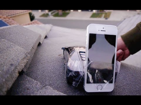 Off - RC Lamborghini Reventon attached to an iPhone 5S drives off the roof of my house. FACEBOOK: https://www.facebook.com/pages/TechRax/192119757502890 TWITTER: h...
