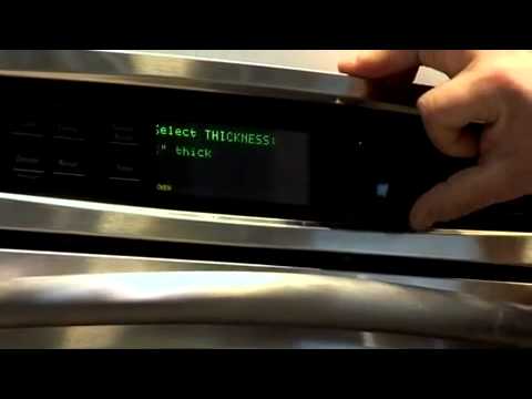 how to lock ge profile oven door