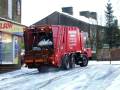 Dustbin lorry stuck in the snow