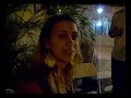D. Jussara (m�e da Fl�via) curando o solu�o da Michelle