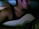 blessed playing the Guitar