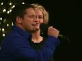 jim brickman performs his holiday hit peace accompanied by electric violinist tracy silverman and vocalists anne cochran, kristy starling and jeff timmons.
