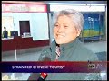 Stranded Chinese tourists return home