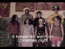Grade 7 and 8 students at Slocan Community School singing a song celebrating Christmas and BC 's endangered Mountain Caribou