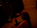 Aly brakes her chair while playing wii :]