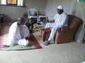 Here is A traditional Odu recitation lesson. The Omo Awos are greeting the Oluwo and respectfully , in atraditional manner asking him to teach them the proper Odu recitation for offering Obi to Ifa. This takes in Abeokuto at The Oluwo's Compound.