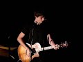 Adam Sisco performing at Hot Monkey Love Cafe